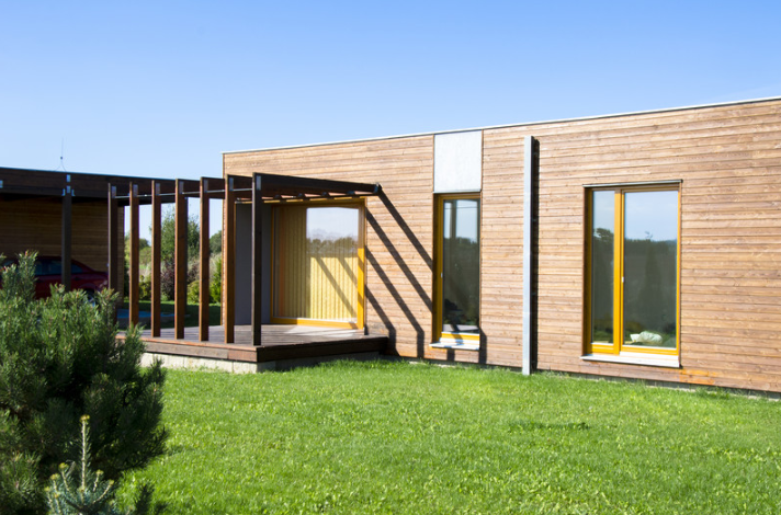 Timber building with black and yellow frame