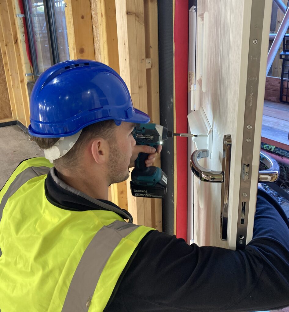 Construction worker in a yellow vest and blue helmet