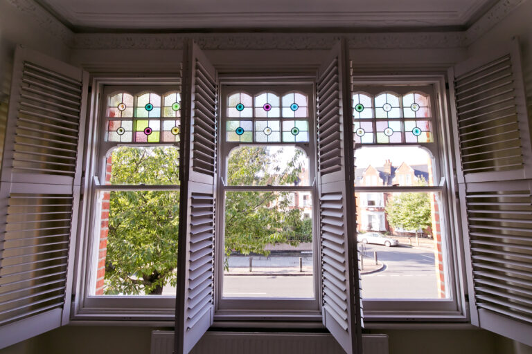 Decorative sash windows with shutters