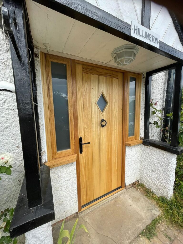 Timber front door with arched glass
