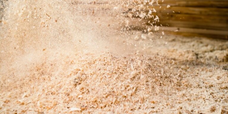 Sawdust particles on workshop floor