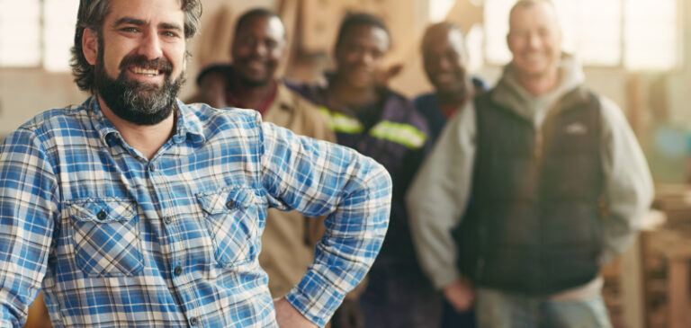 A group of men looking happy