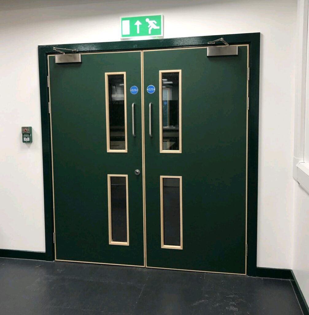 Dark green fire doors