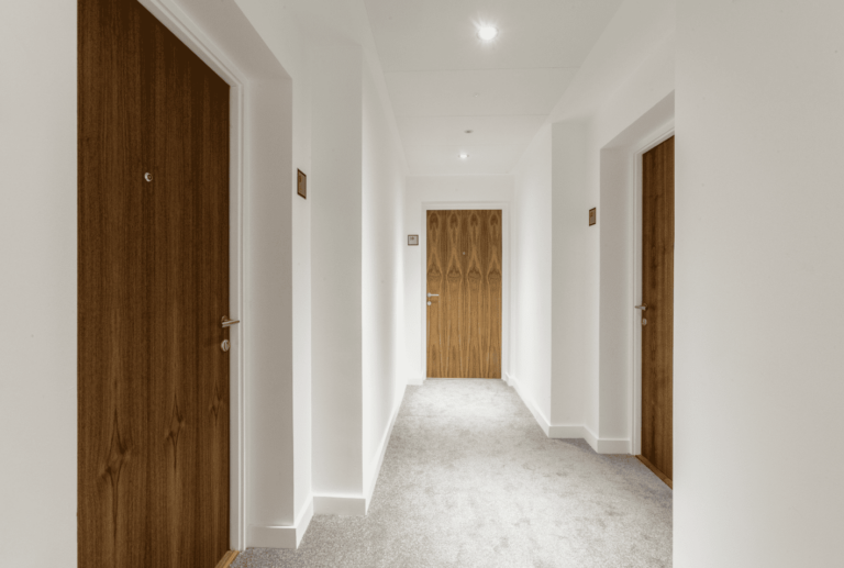 A hall with wooden doors