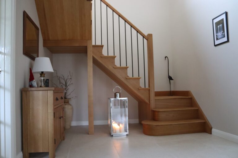 A wooden staircase in a hall