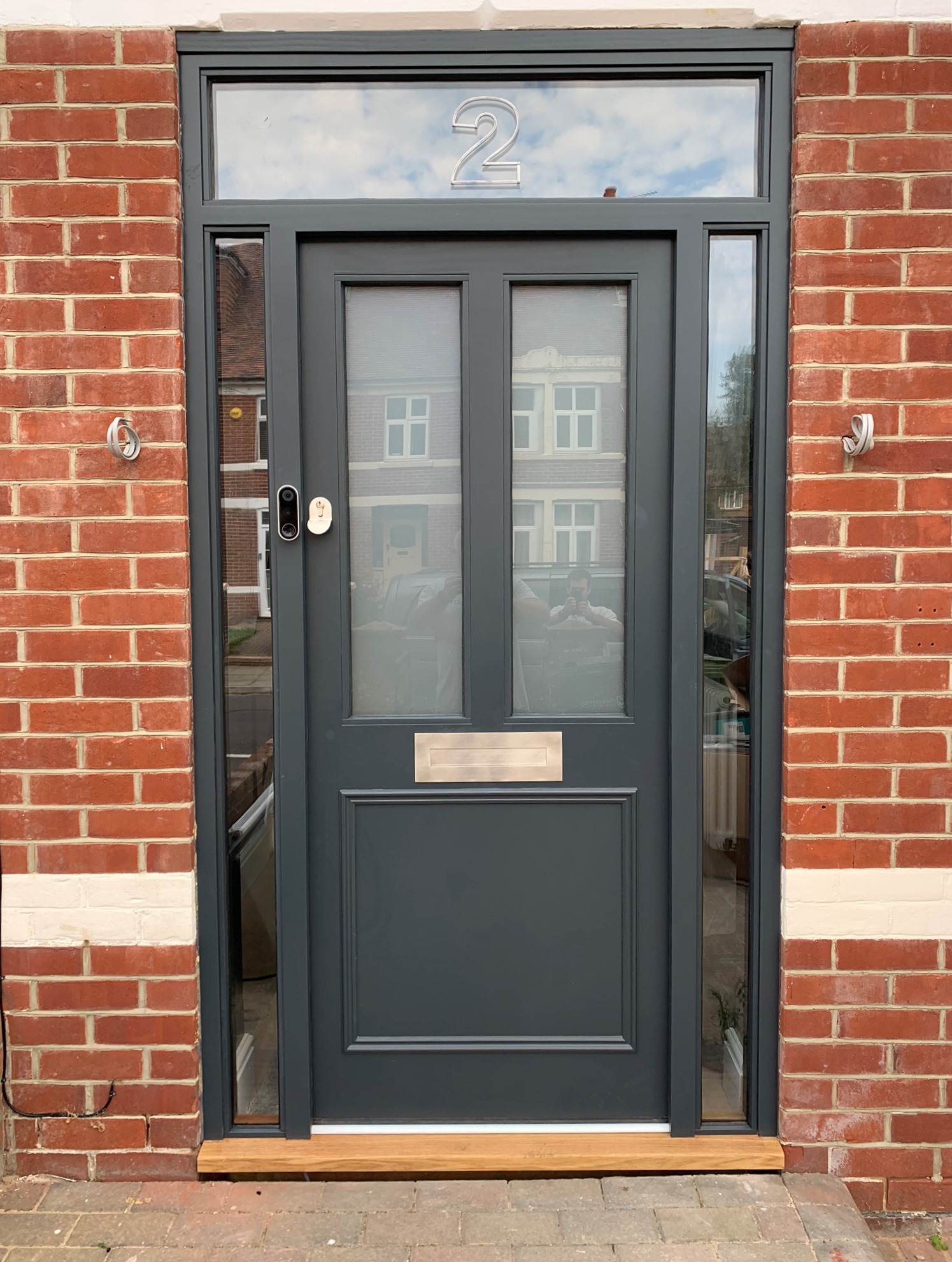 This is an Accoya front door with sidelight supplied as part of the replacement of all windows and doors to a cottage in Hampshire