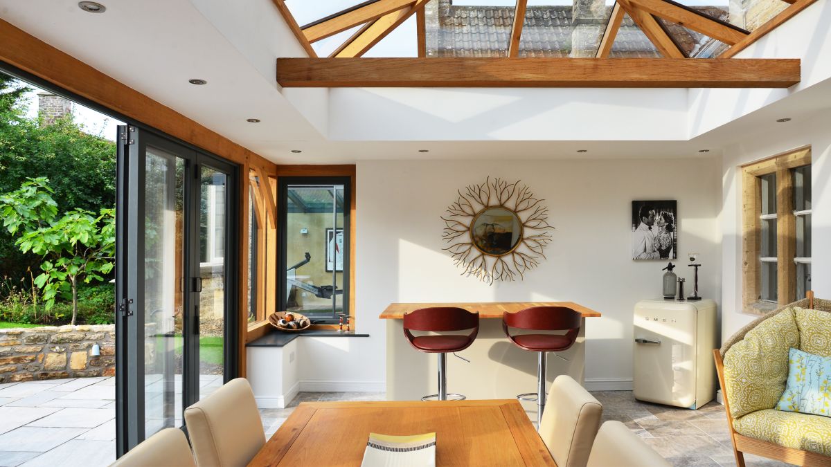 Oak Orangery with Modern Bi-Fold Doors