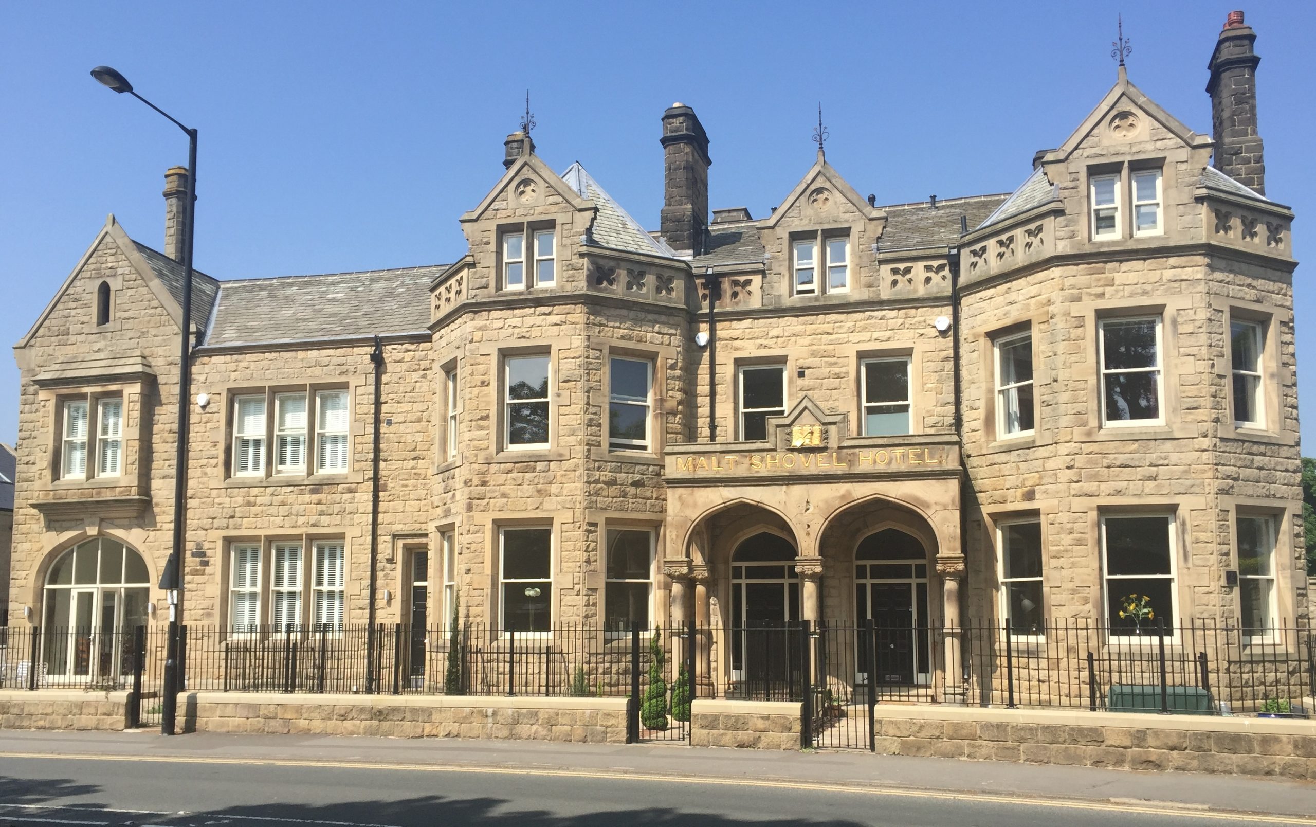 Suny day outside the Former Malt Shovel Hotel with Sash windows