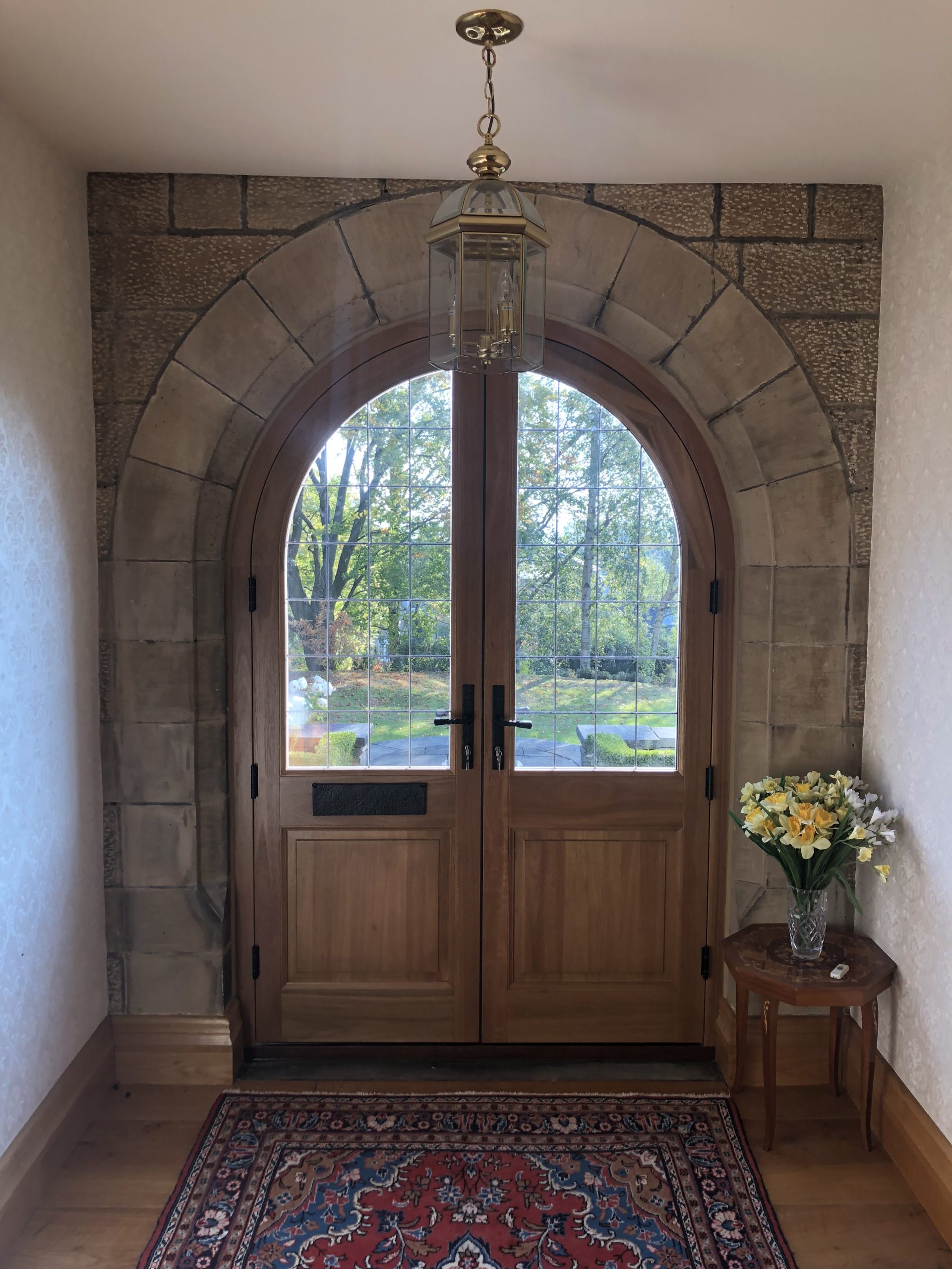 Hotel entrance with bespoke arched double doors