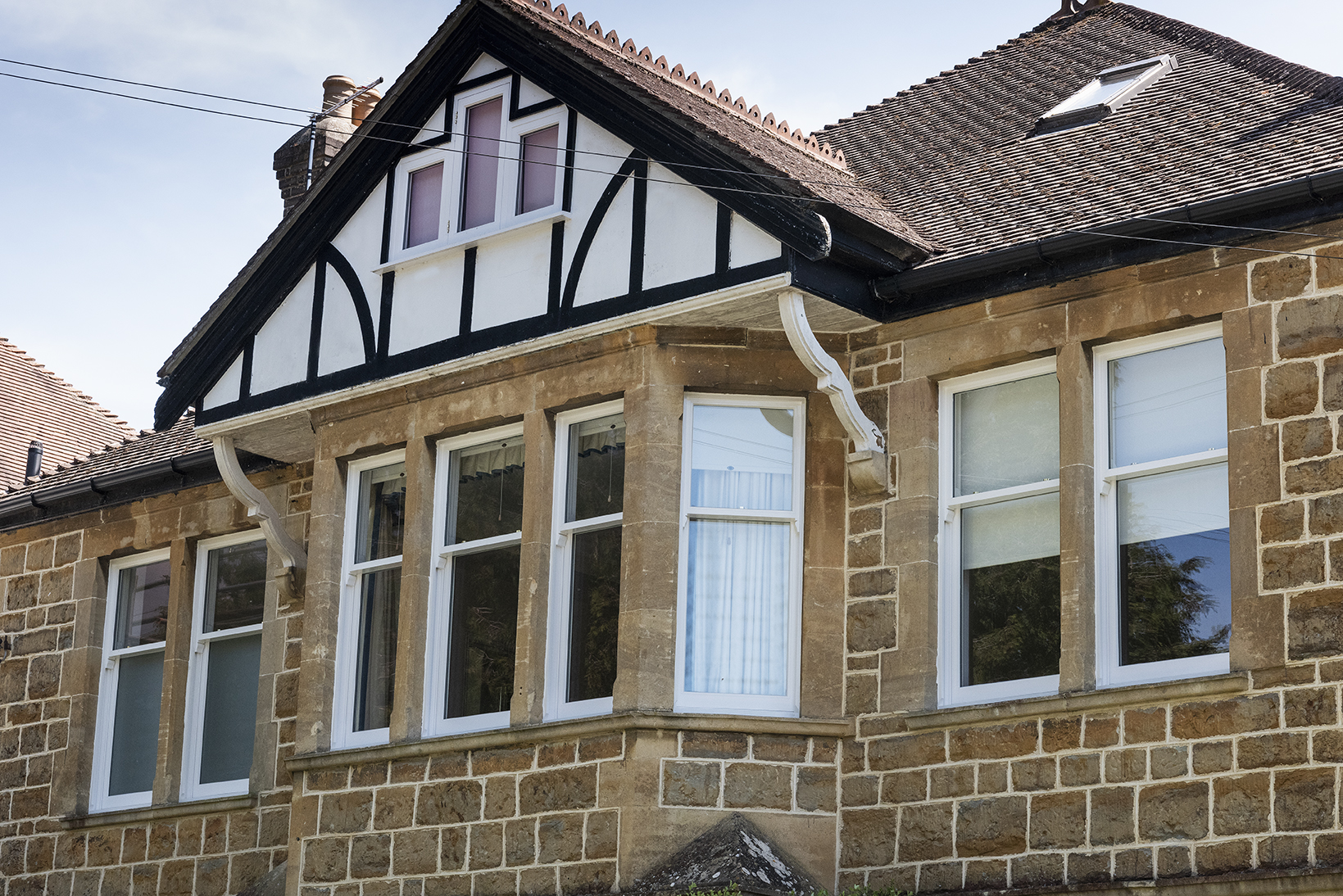 Traditional style doors and windows can be made to conform to today's high insulation, ventilation and access requirements.  Slender glazing bars can be maintained, casements can be storm proofed, or fitted flush with the frames, vertical sliding sashes can operate on pretensioned spiral balances or weights and pulleys.  Our FENSA registration allows us to fit, finish and self certify our own doors and windows.  For listed buildings, existing styles and sections can be copied.