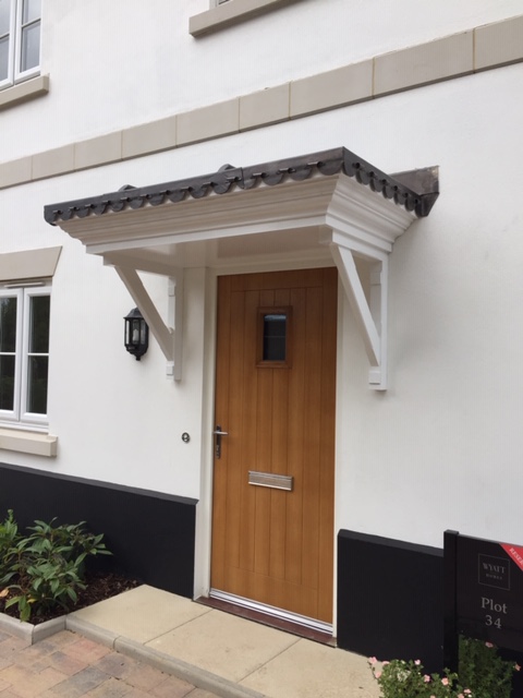 Timber door canopy by Canopy Products Limited