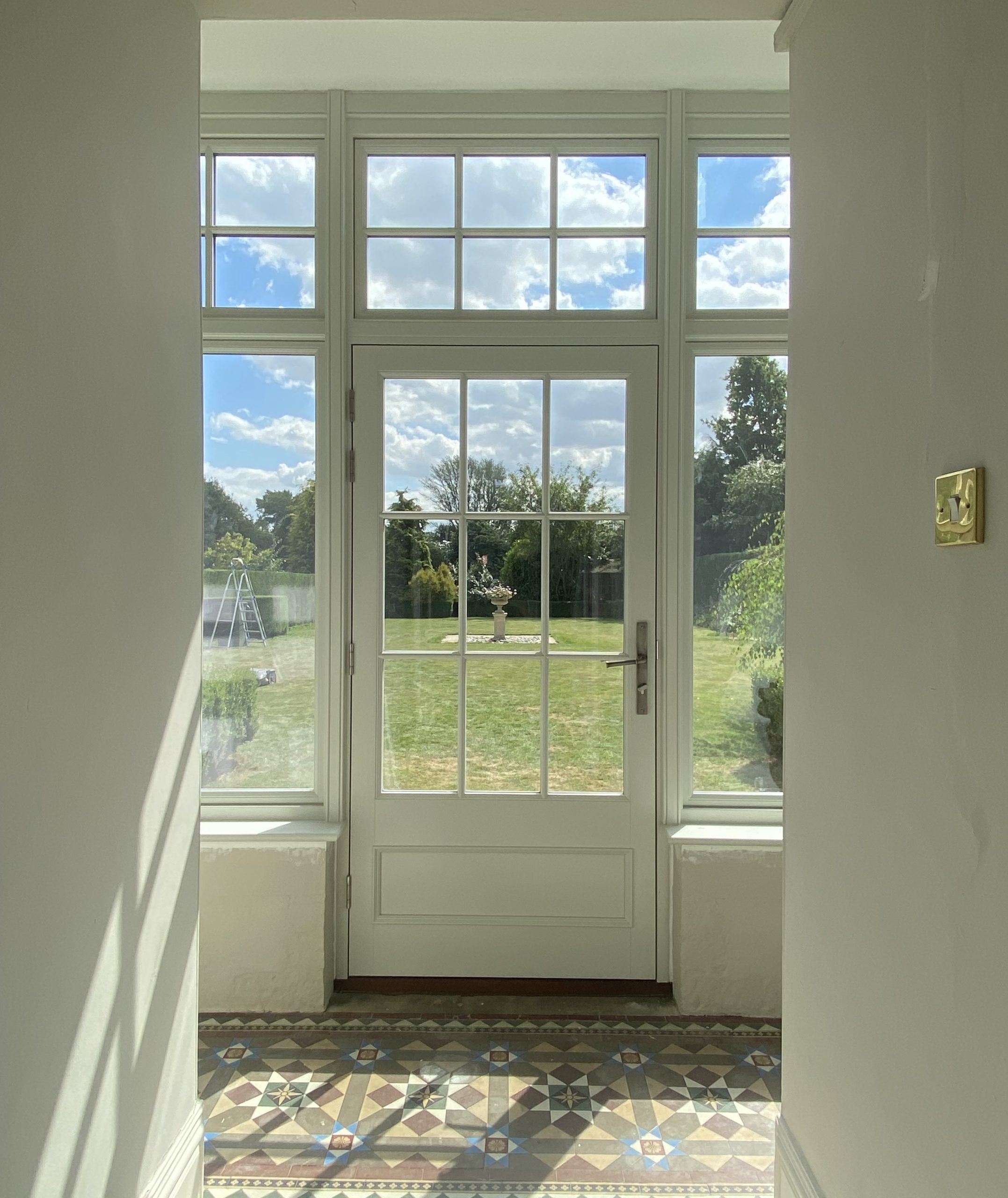 White accoya entrance door